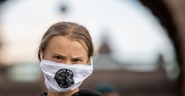 Swedish climate activist Greta Thunberg takes part in a Fridays For Future protest in front of the Swedish Parliament (Riksdagen) in Stockholm, Sweden, Sept. 25, 2020. (AFP Photo)