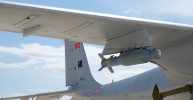 Roketsan's MAM-T munition is seen loaded on a Akıncı UCAV in Ankara, April 22, 2021 (AA Photo)