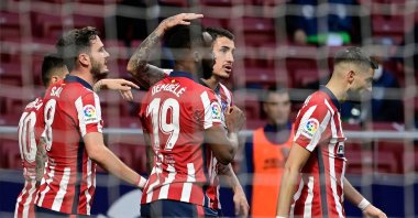 Atletico Madrid players celebrate a goal during the La Liga against Huesca at the Wanda Metropolitano stadium in Madrid, Spain, April 22, 2021. (AFP Photo)