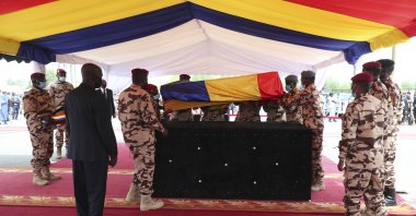 Chadian soldiers carry the coffin of late Chadian President Idriss Deby Itno during the state funeral in N'Djamena, Chad, April 23, 2021. (AP Photo)