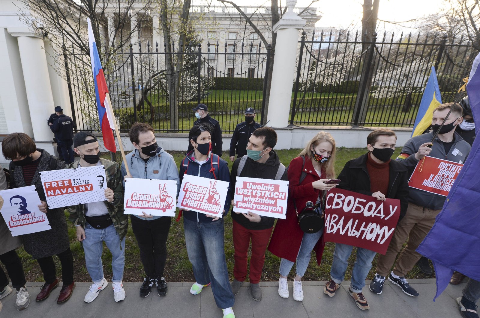 Supporters of imprisoned Russian opposition leader Alexei Navalny stage a protest before the Russian Embassy in Warsaw, Poland, Wednesday, April 21, 2021. (AP Photo)