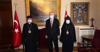 President Recep Tayyip Erdoğan (C) meets with Armenian Patriarch Sahak Maşalyan (L) in Istanbul, Turkey, Oct. 22, 2020. (AA Photo)