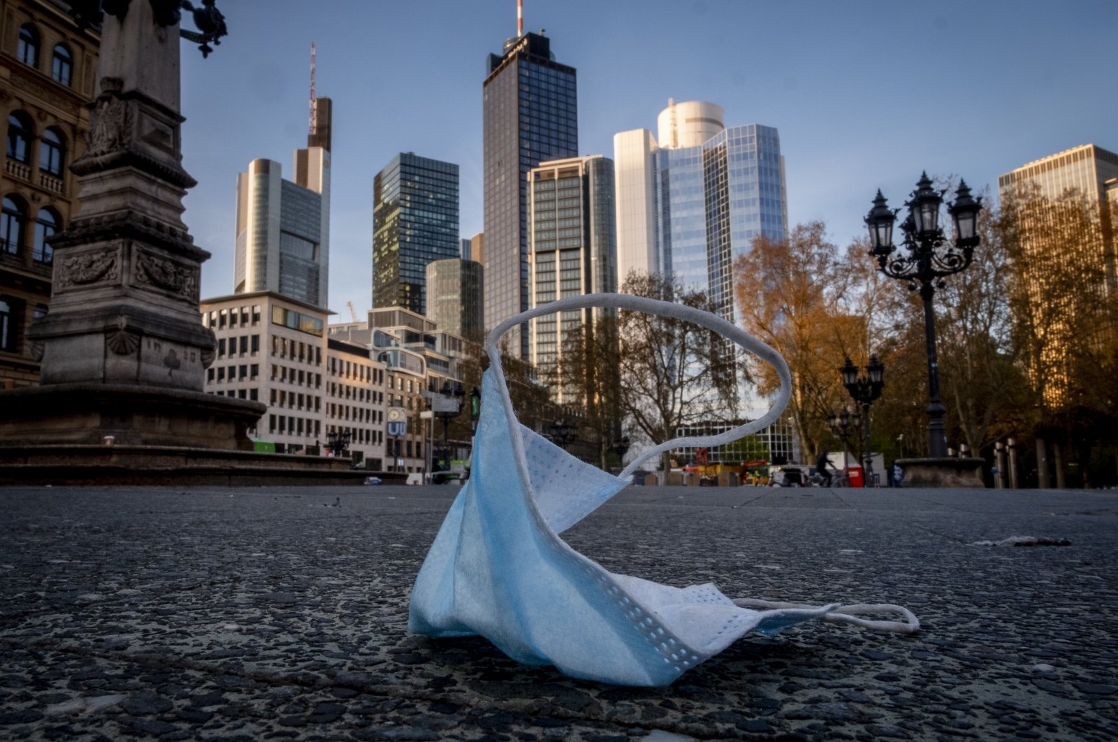 A face mask is left back on the opera square in Frankfurt, Germany, April 24, 2021. (AP Photo)