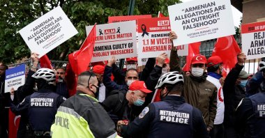 Supporters of Turkey counter protest members of the Armenian diaspora as they rally in front of the Turkish Embassy after U.S. President Joe Biden recognized the 1915 events as "genocide" in Washington, U.S., April 24, 2021. (Reuters Photo)