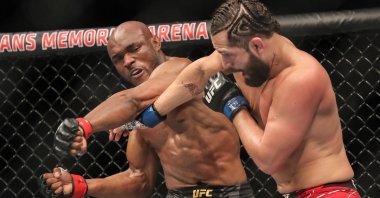 Nigeria's Kamaru Usman (L) fights the U.S.' Jorge Masvidal during the Welterweight Title bout of UFC 261 at VyStar Veterans Memorial Arena, Jacksonville, Florida, April 25, 2021. (AFP Photo)