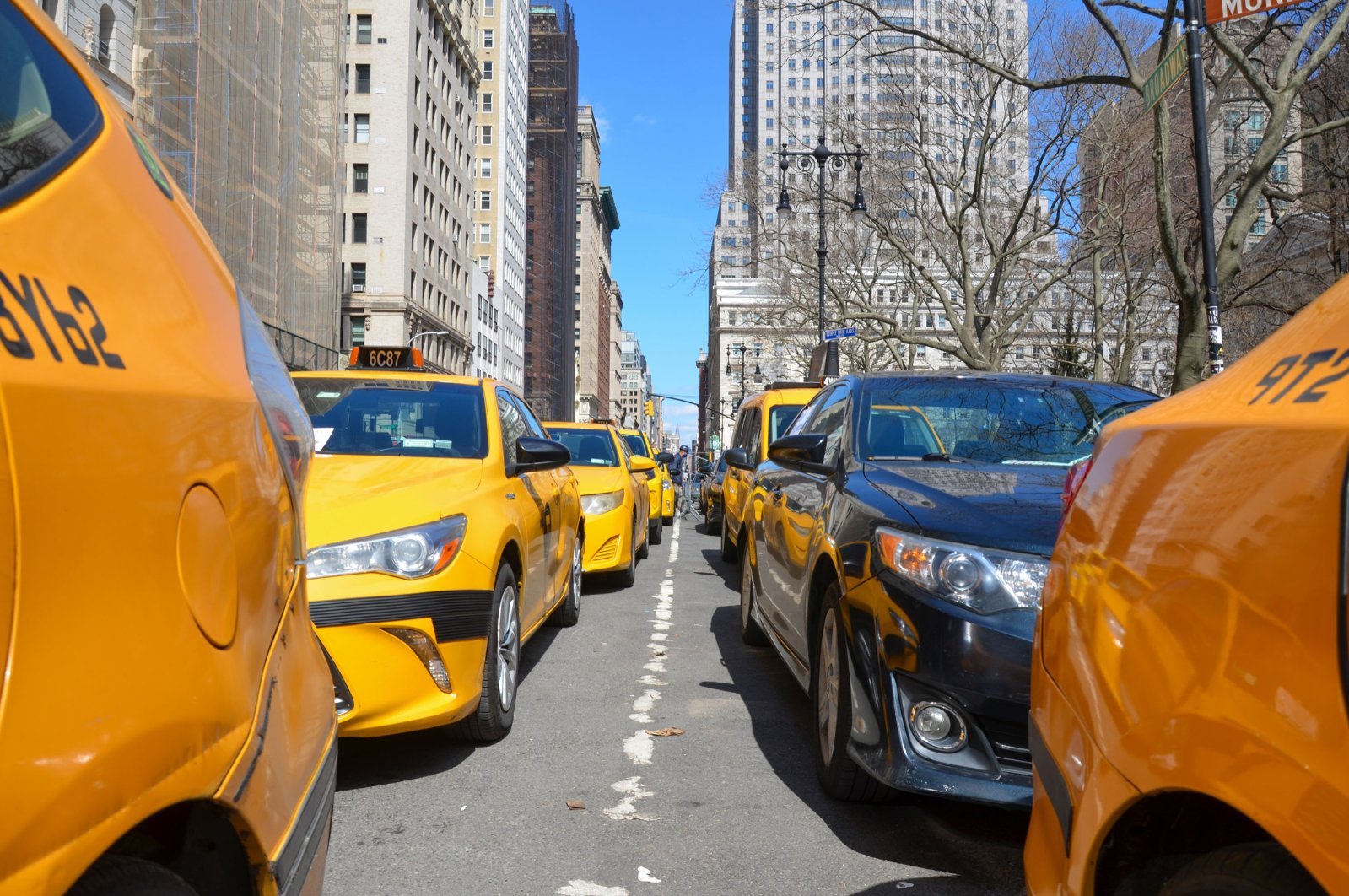 Yellow taxis are lined up near New York City Hall demanding Mayor Bill de Blasio to support the Drivers plan to help the drivers live their lives debt-free, March 27, 2021. (Getty Images)