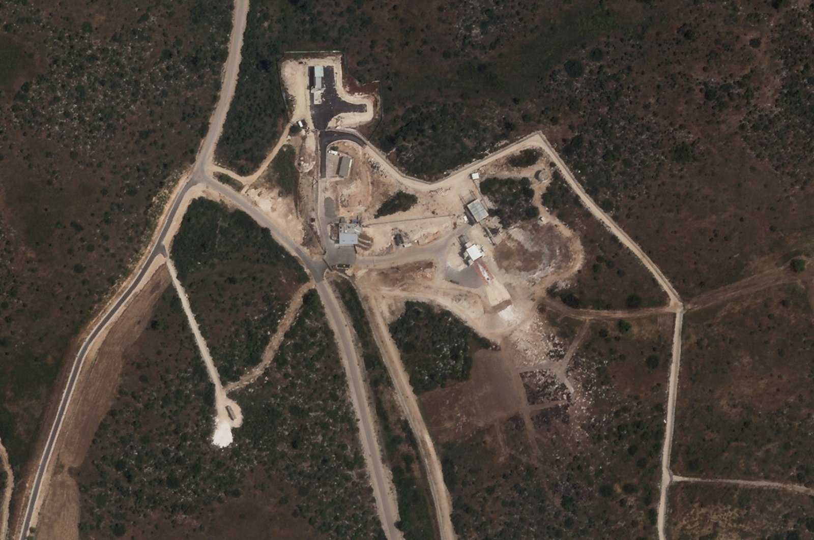 A satellite photo shows what analysts describe as a test site for rocket motors at the secretive Sdot Micha Air Base, Israel, April 24, 2021. (Planet Labs Inc. via AP)