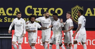 Real Madrid's players celebrate a goal during a La Liga match against Cadiz at the Ramon Carranza stadium in Cadiz, Spain, April 21, 2021. (AP Photo)