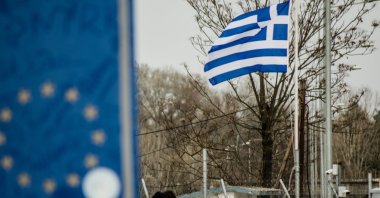 The Greek flag is seen on the border with Turkey at the Kastanies border crossing point, Greece, March 9, 2020. (Photo by Getty Images)
