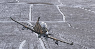 TAI's Hürkuş-C aircraft is pictured mid-flight in this file photo from Dec. 31, 2018. (Courtesy of the Presidency of Defense Industries)