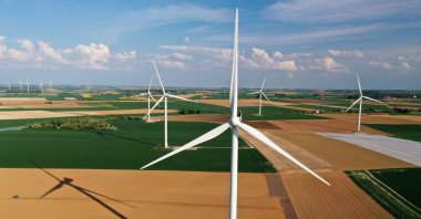 An aerial view shows power-generating windmill turbines in a wind farm in Graincourt-les-Havrincourt, France, April 27, 2020. (Reuters Photo)