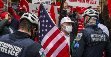 Supporters of Turkey face-off with Armenian supporters outside the Turkish Embassy after U.S. President Joe Biden's controversial remarks on the 1915 events, in Washington, D.C., U.S., April 24, 2021. (AFP Photo)