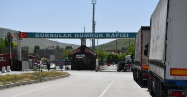 Trucks loaded with goods seen at the Gürbulak Border Gate on the Turkey-Iran border, Ağrı province, eastern Turkey, April 6, 2020. (AA Photo)