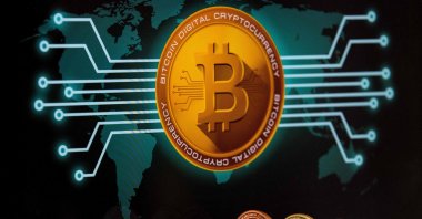 A visual representation of the digital cryptocurrency bitcoin at the "Bitcoin Change" shop in the Israeli city of Tel Aviv. (AFP Photo)