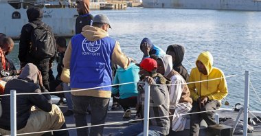 Migrants arrive at a naval base in the Libyan capital of Tripoli after the coastguard intercepted an inflatable boat carrying 138 Europe-bound migrants off its west coast, Tripoli, Libya, March 31, 2021. (AFP File Photo)