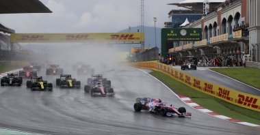 Racing Point driver Lance Stroll of Canada leads at the start of the Formula One Turkish Grand Prix at the Istanbul Park circuit racetrack in Istanbul, Turkey, Nov. 15, 2020. (AP Photo))