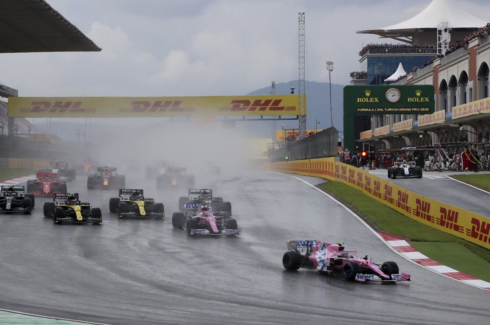 Racing Point driver Lance Stroll of Canada leads at the start of the Formula One Turkish Grand Prix at the Istanbul Park circuit racetrack in Istanbul, Turkey, Nov. 15, 2020. (AP Photo))