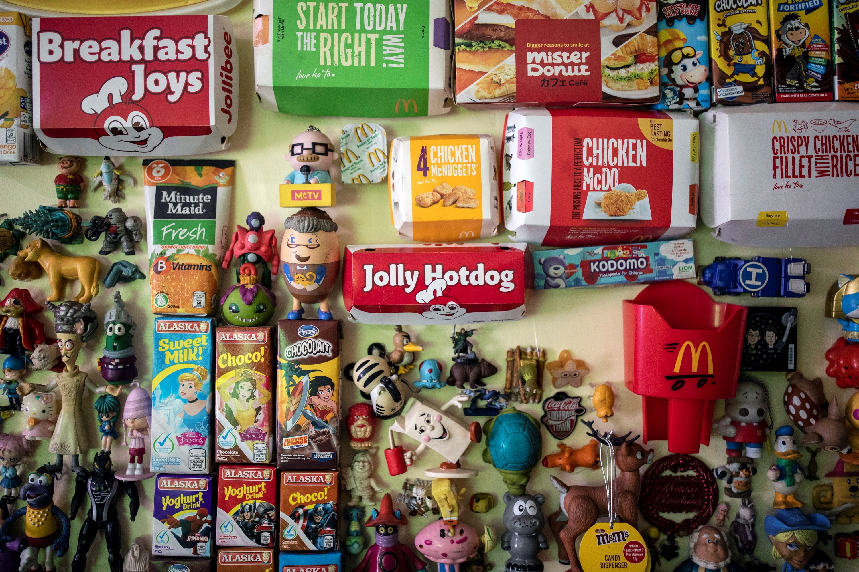 Percival Lugue, who has the Guinness world record for the largest fast-food toy collection, poses with his toy collection in his home in Apalit, Pampanga province, Philippines, April 20, 2021. (REUTERS Photo)