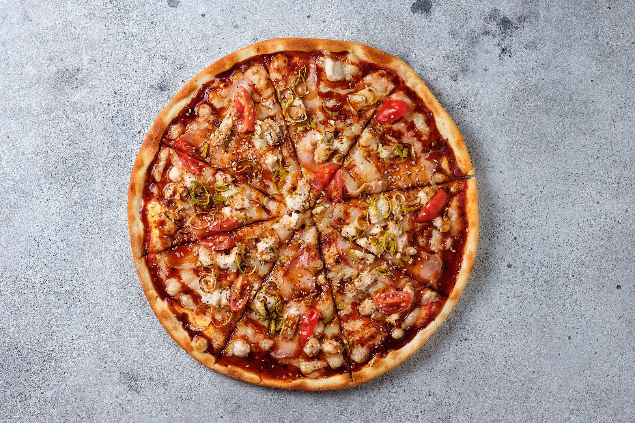 Teriyaki or barbecue chicken pizza is a crowd favorite. (Shutterstock Photo)