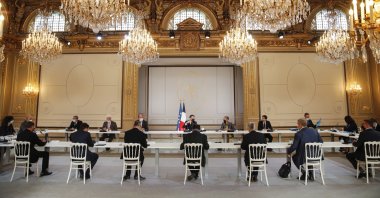 French President Emmanuel Macron (C) meets with French Labour Union representatives in preparation for the Porto European summit, at the Elysee Palace in Paris, France, April 29, 2021.  (EPA Photo)