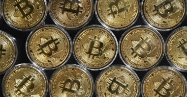 A physical imitation of a Bitcoin at a cryptocurrency shop, near the Grand Bazaar, in Istanbul, Turkey, Sept. 24, 2020. (AFP Photo)