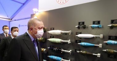 President Recep Tayyip Erdoğan inspects ammunitions at the newly opened MKEK factory in Ankara, Turkey, April 29, 2021. (AA Photo)