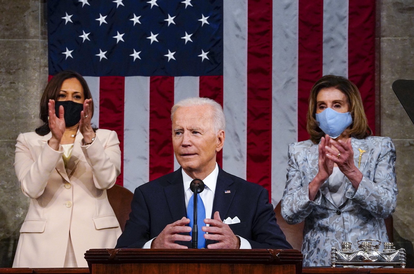 Vice President Kamala Harris and House Speaker Nancy Pelosi of Calif., stand and applaud as President Joe Biden addresses a joint session of Congress, Wednesday, April 28, 2021, in the House Chamber at the U.S. Capitol in Washington. (The Washington Post via AP)