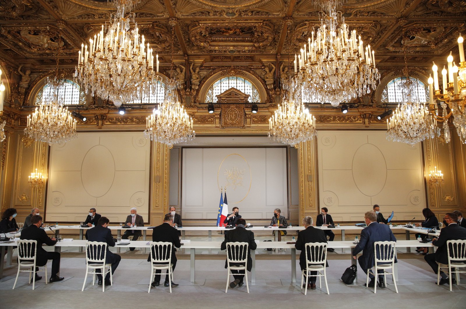 French President Emmanuel Macron (C) meets with French Labour Union representatives in preparation for the Porto European summit, at the Elysee Palace in Paris, France, April 29, 2021.  (EPA Photo)