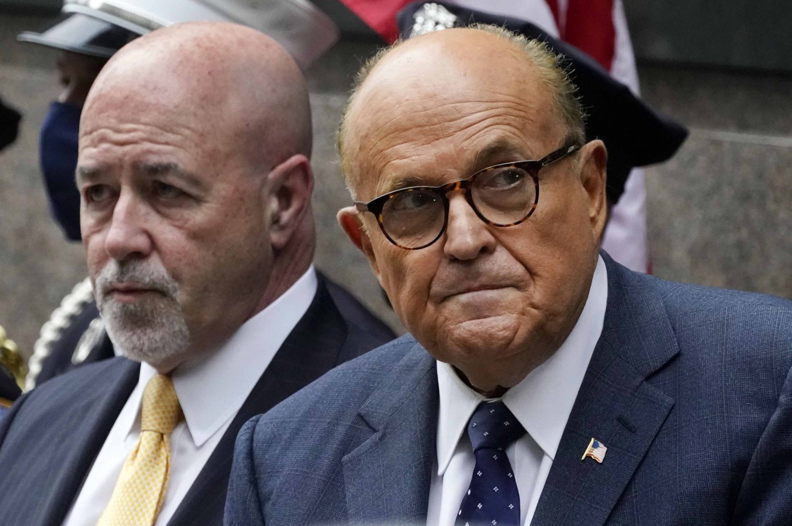 Former New York Mayor Rudolph Giuliani, right, and former New York City Police Commissioner Bernard Kerik (L) during the Tunnel to Towers ceremony in New York, U.S., Sept. 11, 2020. (AP Photo)
