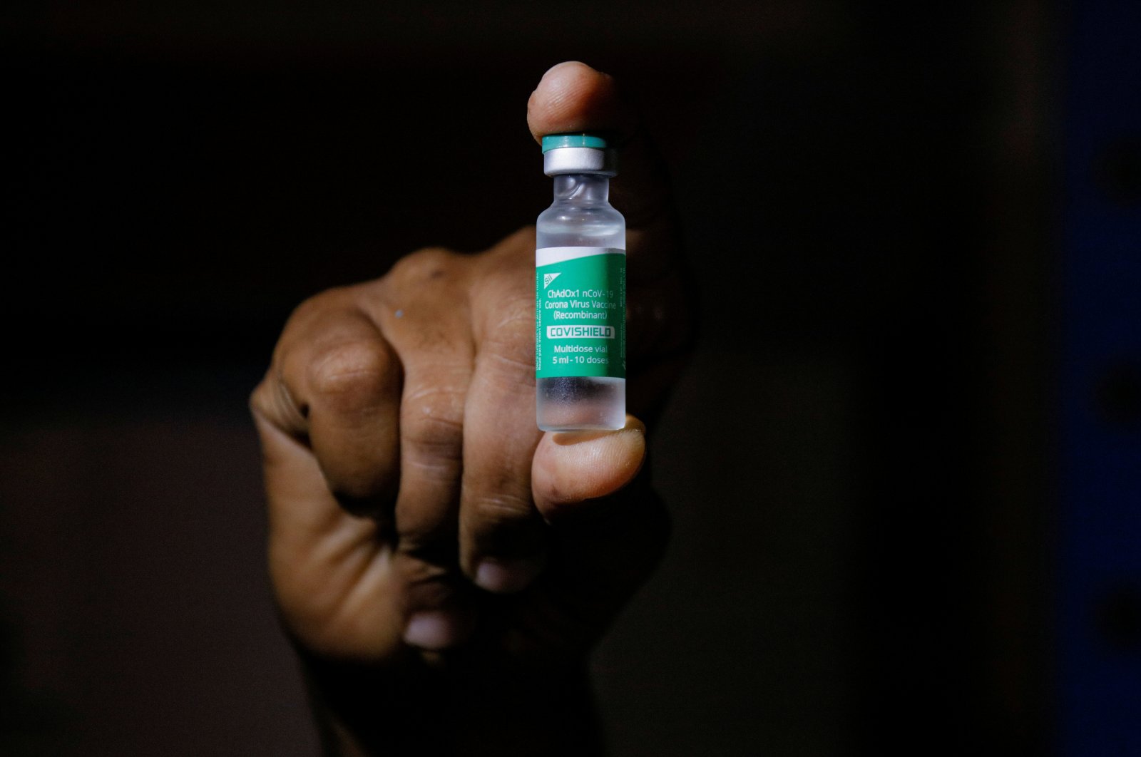 A man displays a vial of AstraZeneca's Covishield vaccine in Accra, Ghana, Feb. 24, 2021. (Reuters File Photo)