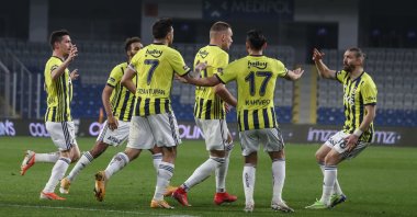 Fenerbahçe players celebrate a goal against Başakşehir in a Süper Lig match, Istanbul, Turkey, April 18, 2021.