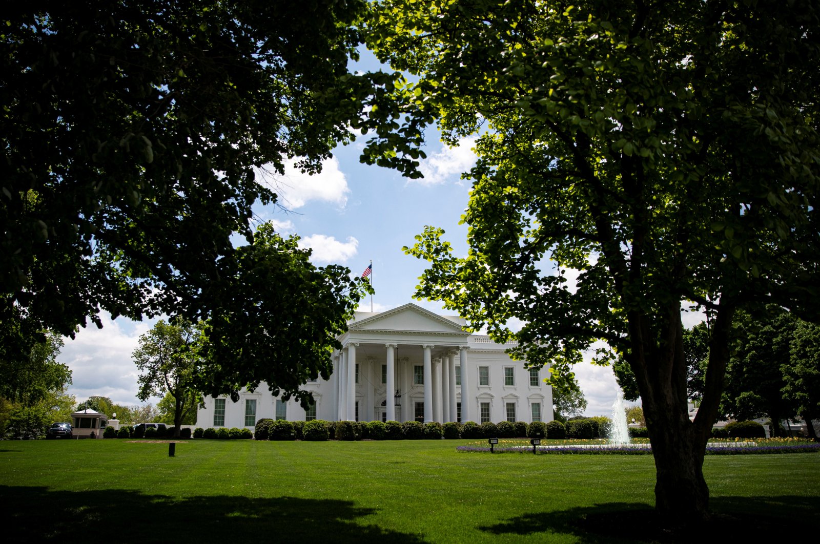 Trees obscure the White House in Washington, D.C., the U.S., April 25, 2021. (Reuters Photo)