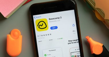 The Basecamp 3 mobile app logo is seen on a phone screen. (Shutterstock Photo)