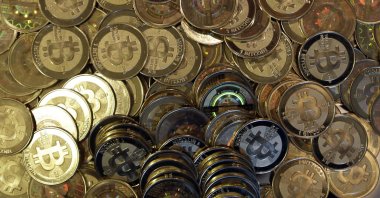 Bitcoin tokens are seen in Sandy, Utah, U.S., April 3, 2013. (AP Photo)