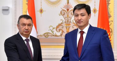 Tajik Prime Minister Kohir Rasulzoda (L) and Kyrgyz Prime Minister Ulukbek Maripov shake hands during a bilateral meeting before a session of the Eurasian Economic Union (EAEU) Intergovernmental Council in Kazan, Russia, April 29, 2021. (EPA Photo)