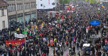 YPG/PKK terrorist group banners are displayed during the so-called "Revolutionary Mayday" demonstration at Hermannplatz in the Kreuzberg district of Berlin, Germany, May 1, 2021. (AFP Photo)