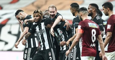 Beşiktaş forward Georges Kevin N'Koudou (2nd L) celebrates with his teammates after a goal in the Turkish Süper Lig Match against Atakaş Hatayspor at Vodafone Park in Istanbul, Turkey, May 1, 2021. (AA Photo)