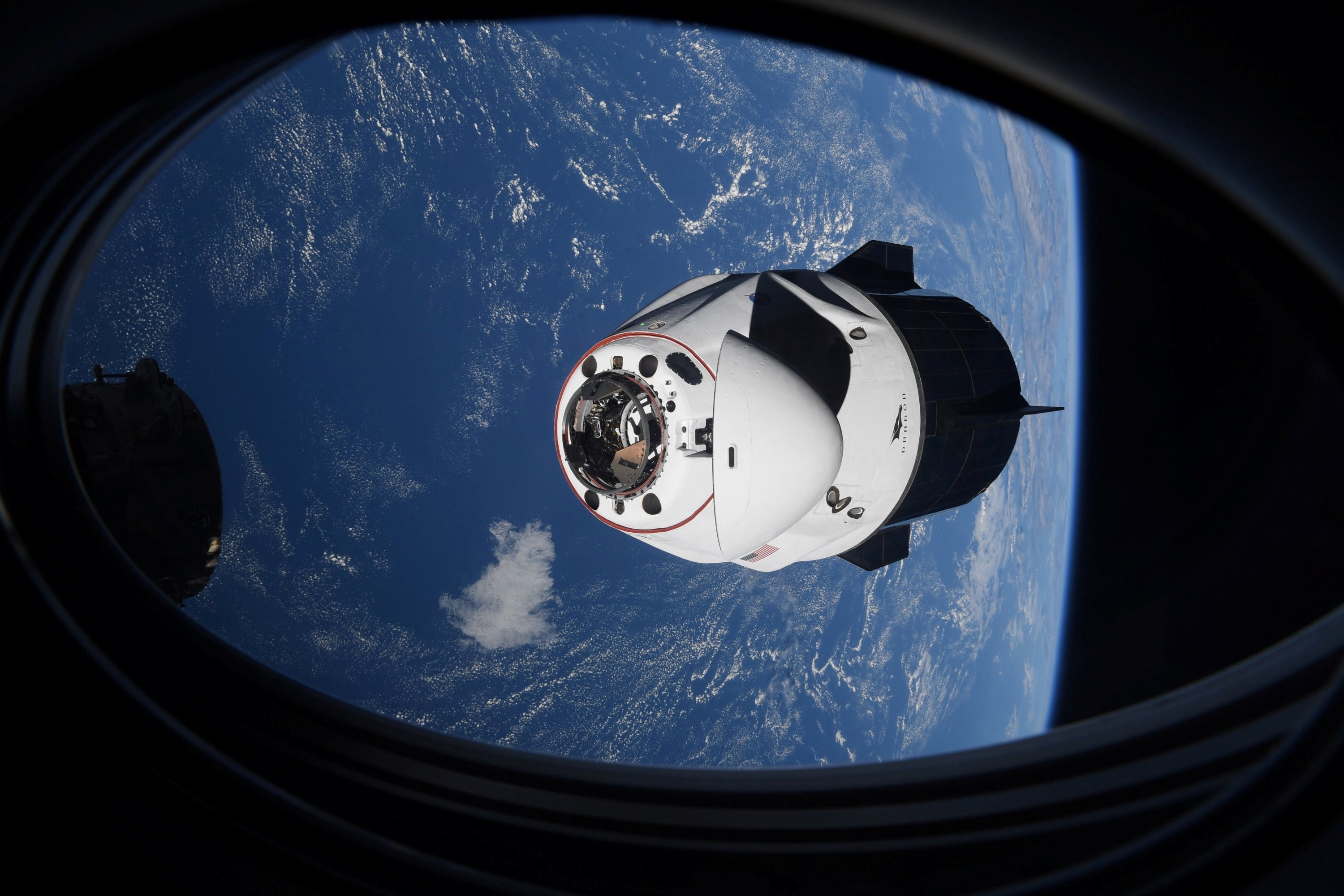 spacex dragon returns to earth