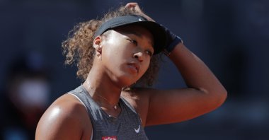 Japan's Naomi Osaka reacts during her match against the Czech Republic's Karolina Muchova at the Madrid Open, Madrid, Spain, May 2, 2021. (AP Photo)