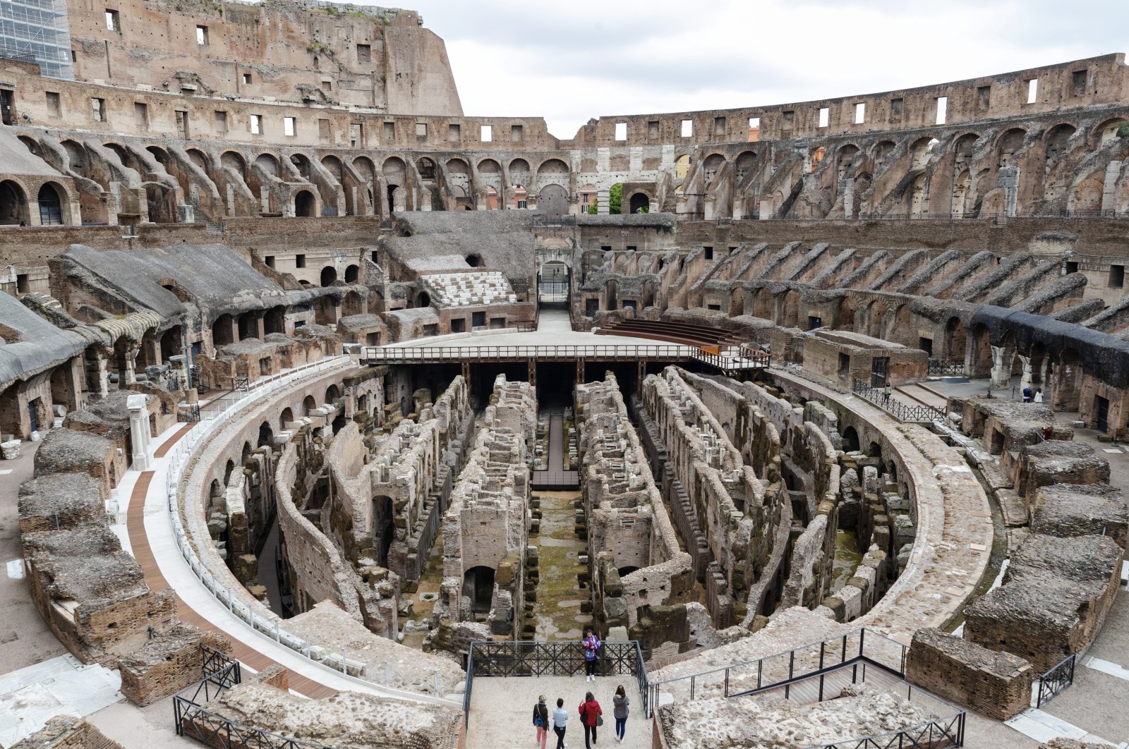 Few visitors arrive for their tour of the ancient Colosseum, in Rome, April 26, 2021. (AP Photo)