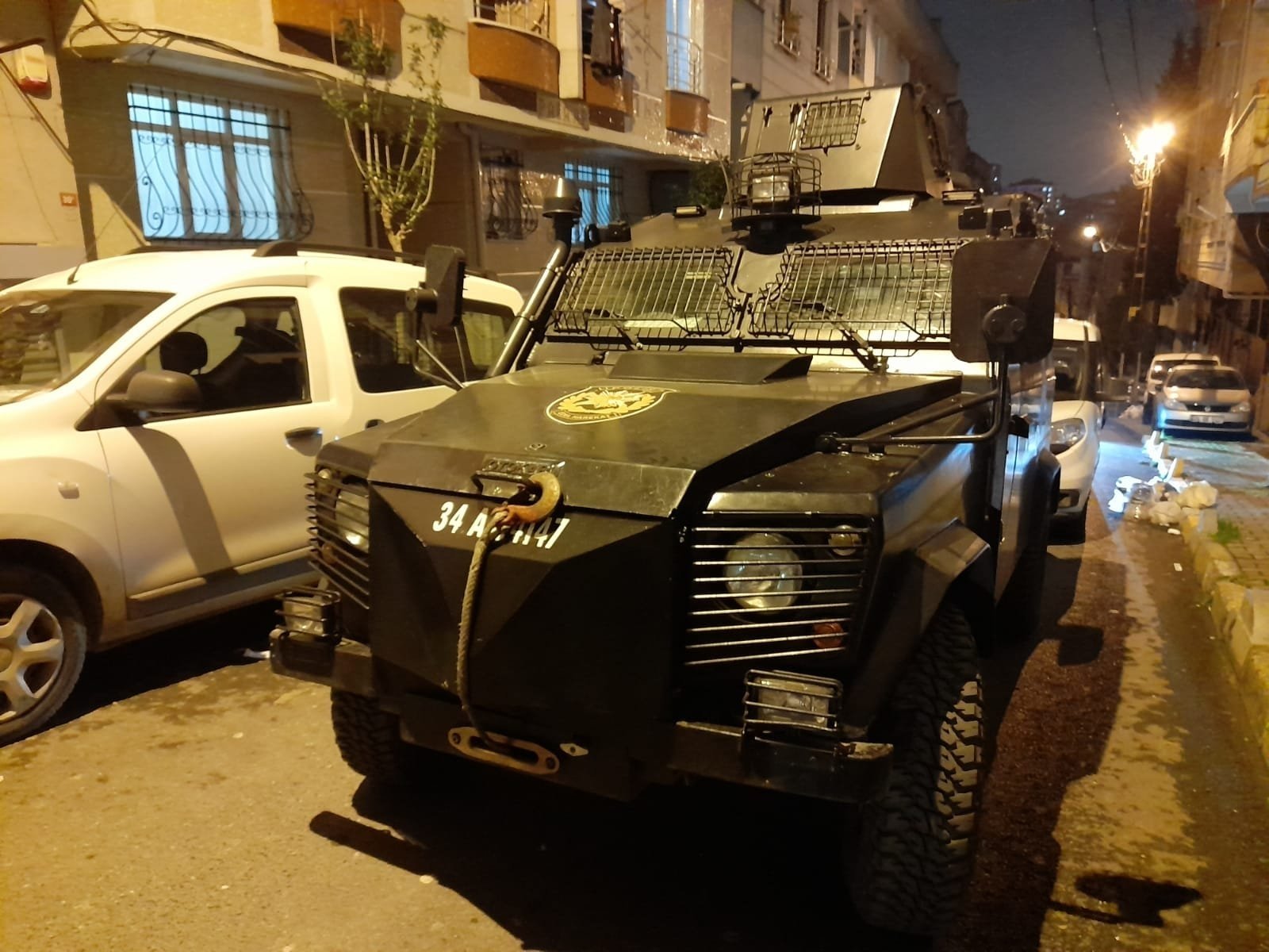 An armored police vehicle pictured in front of an apartment building in Istanbul's Bağcılar district, Istanbul, Turkey, April 7, 2021. (DHA Photo)