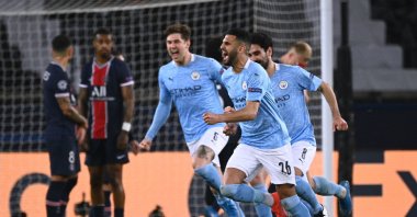 Manchester City's Algerian midfielder Riyad Mahrez celebrates after scoring a goal during the UEFA Champions League first-leg semifinal match against Paris Saint-Germain at the Parc des Princes stadium, Paris, France, April 28, 2021. (AFP Photo)