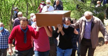 People attend the funeral of Emine Baltacı in Trabzon, Turkey, on May 2, 2021. (IHA Photo)