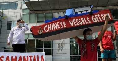 Filipino demonstrators stage a protest rally to denounce the continued intrusion of Chinese patrol ships inside the Philippine territory in the disputed South China sea, in front of the Chinese Consulate in Manila, Philippines, April 23, 2021. (EPA)
