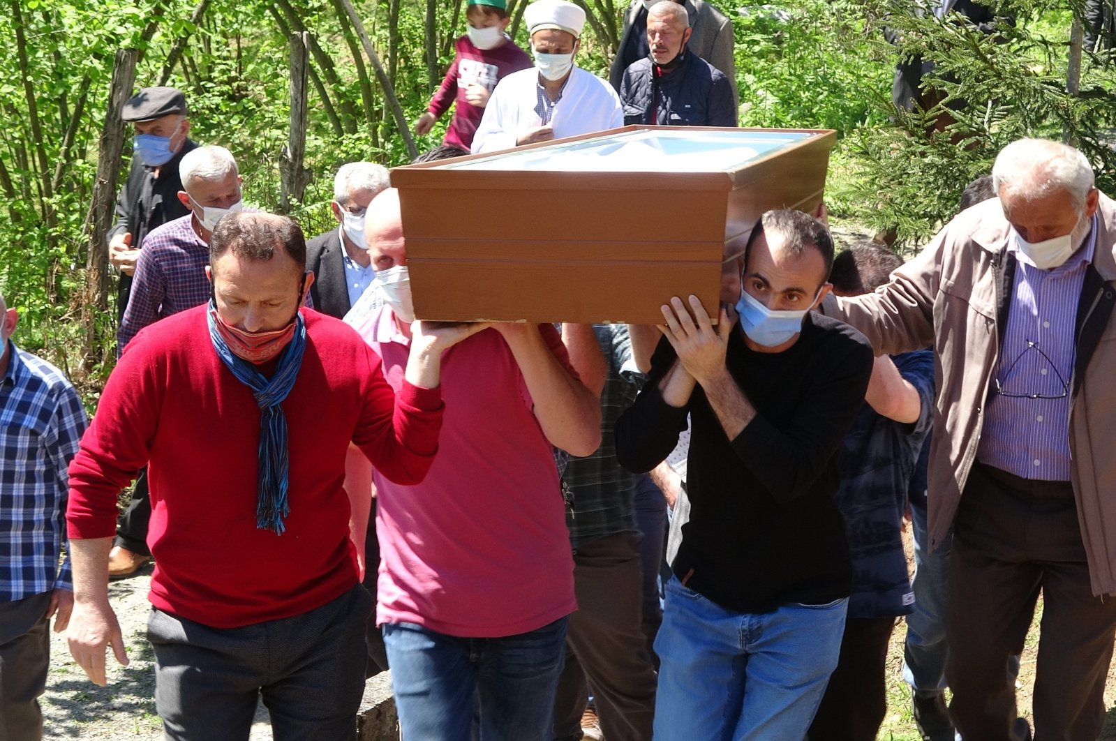 People attend the funeral of Emine Baltacı in Trabzon, Turkey, on May 2, 2021. (IHA Photo)