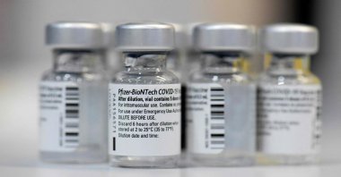 Empty vials of the Pfizer-BioNTech COVID-19 disease vaccine are displayed at the regional coronavirus vaccination center in Ludwigsburg, southern Germany, Jan. 22, 2021. (AFP Photo)