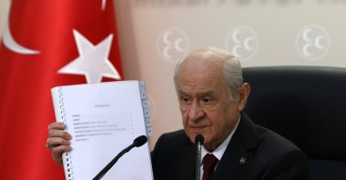 MHP Chairperson Devlet Bahçeli speaks to reporters about his party's constitution proposal at the MHP headquarters in Turkey's capital Ankara, May 4, 2021. (AA Photo)