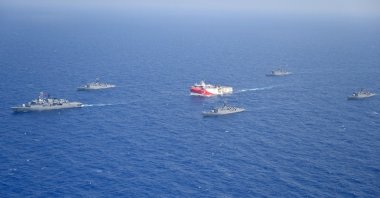 Turkey's research vessel Oruç Reis (C) is surrounded by Turkish navy vessels as it was heading toward the west of Antalya on the Mediterranean, Turkey, Aug. 10, 2020. (AP Photo)