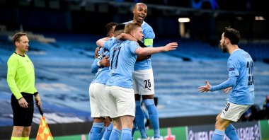 Manchester City's Fernandinho (C) and his teammates celebrate their team's 1-0 lead during the UEFA Champions League semi final, second leg soccer match between Manchester City and Paris Saint-Germain in Manchester, Britain, 04 May 2021. (EPA Photo)