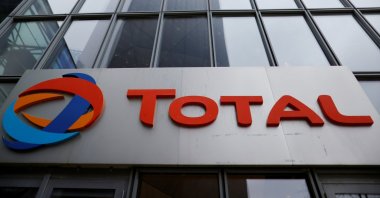The logo of French oil and gas company Total is seen at La Defense business district in Courbevoie near Paris, France, February 8, 2021. (Reuters Photo)